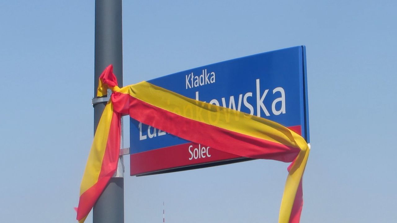 LOW ANGLE VIEW OF FLAG AGAINST BLUE SKY