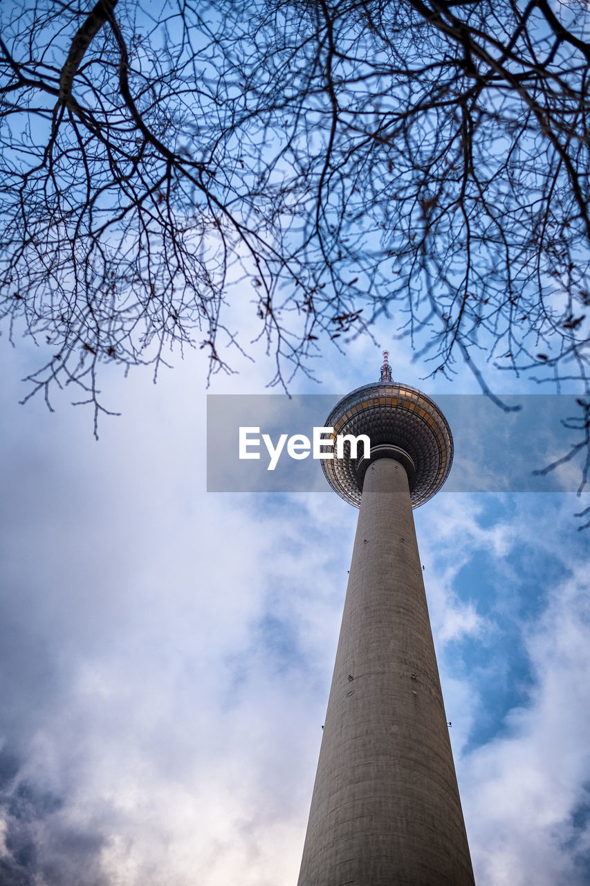 LOW ANGLE VIEW OF COMMUNICATIONS TOWER AGAINST SKY