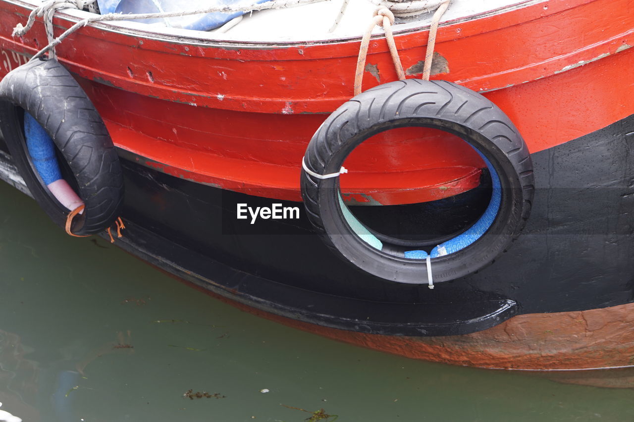 CLOSE-UP OF NAUTICAL VESSEL IN WATER