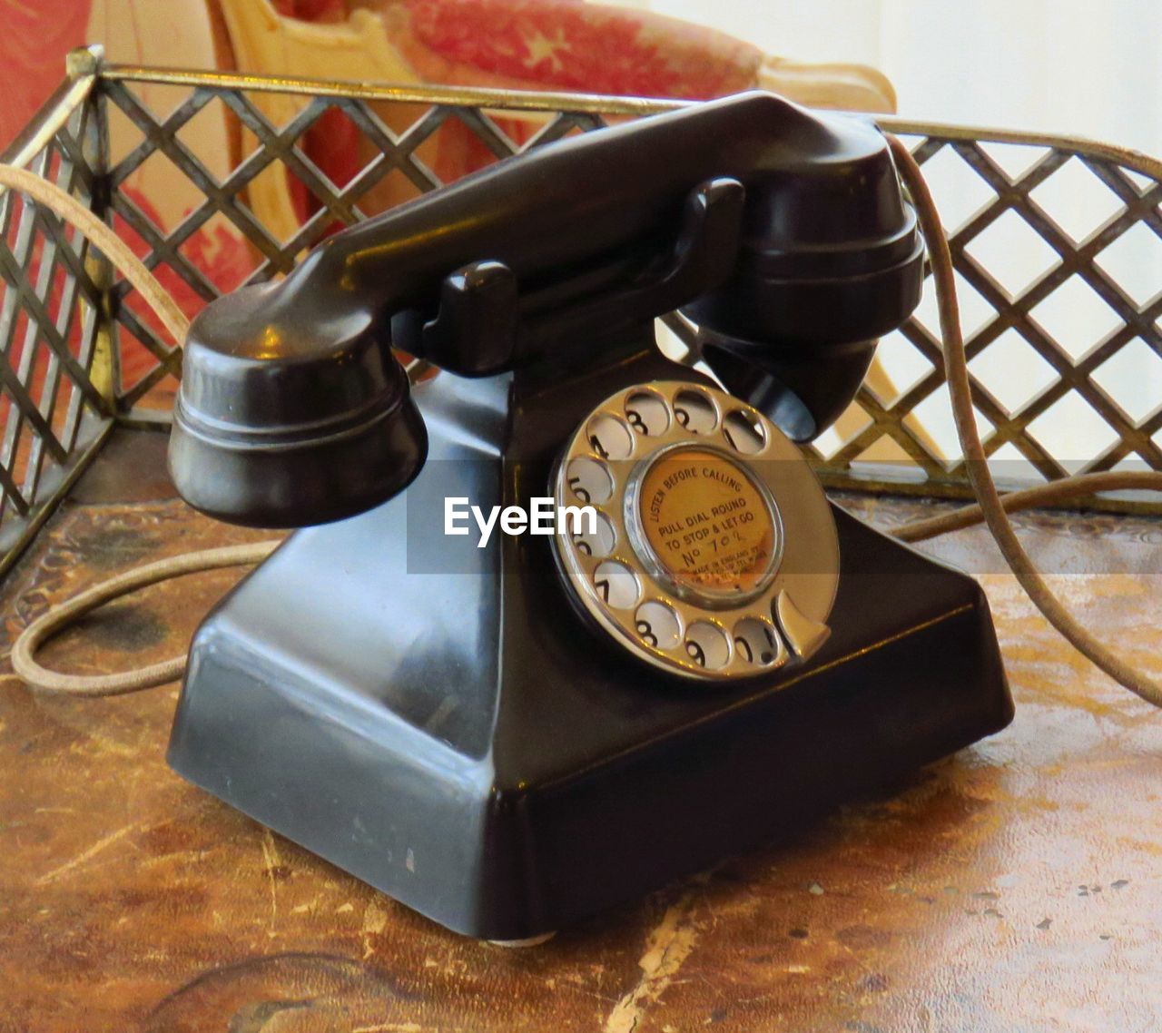 CLOSE-UP OF OLD TELEPHONE BOOTH