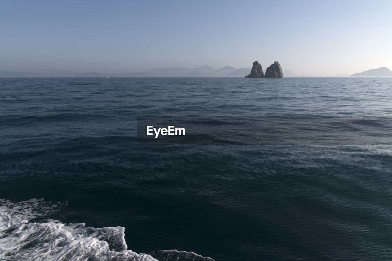 Scenic view of sea against clear sky