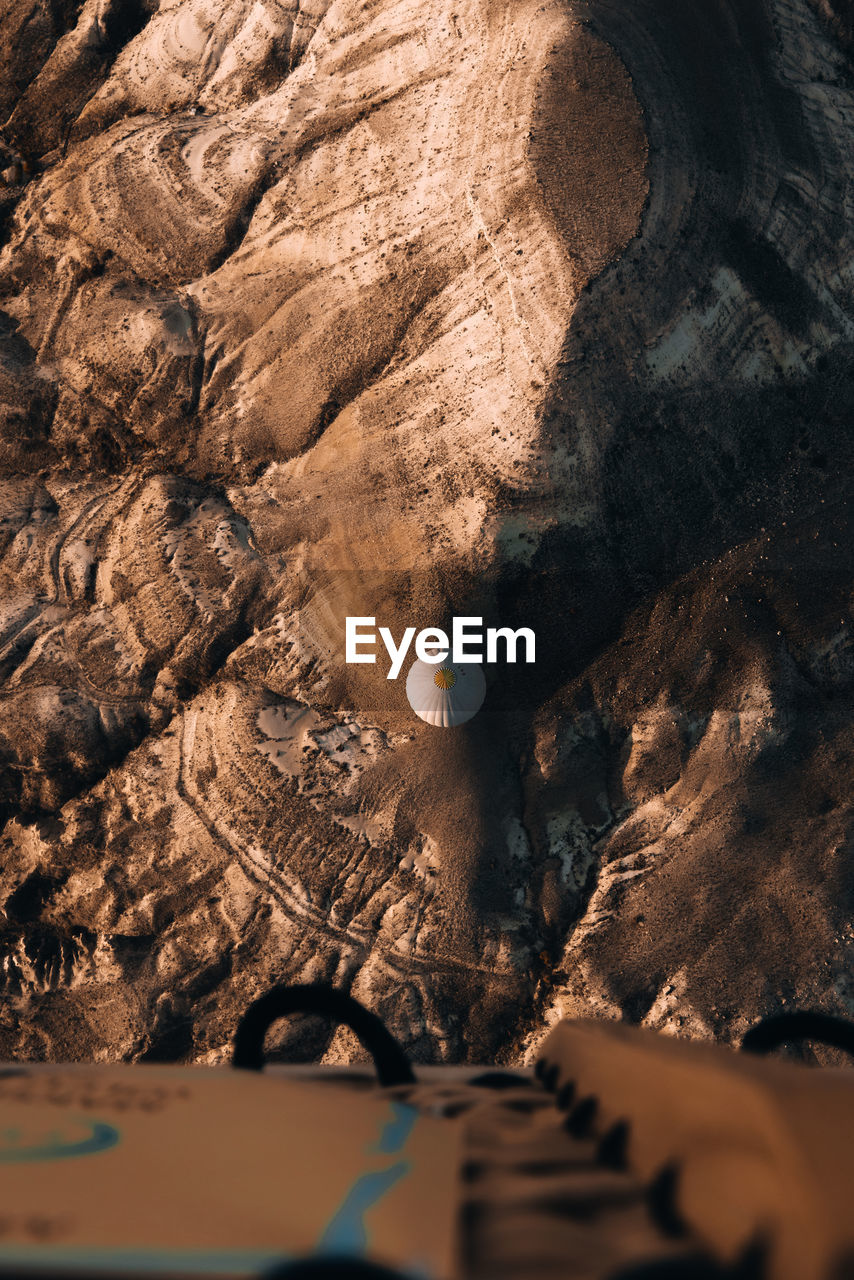 High angle view of a hot air ballon around rock formations