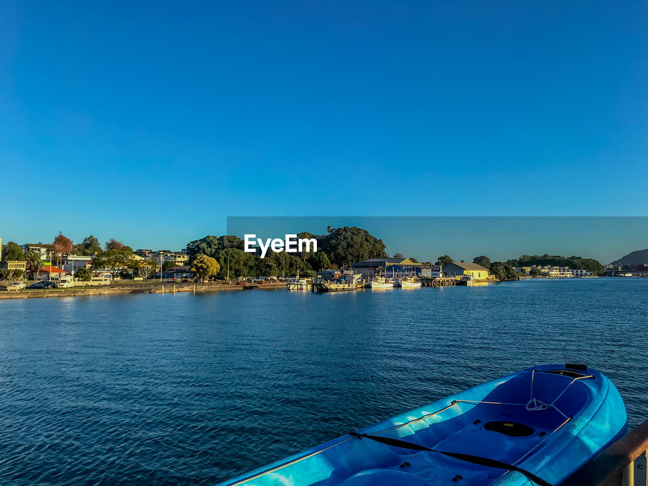 Scenic view of sea against clear blue sky
