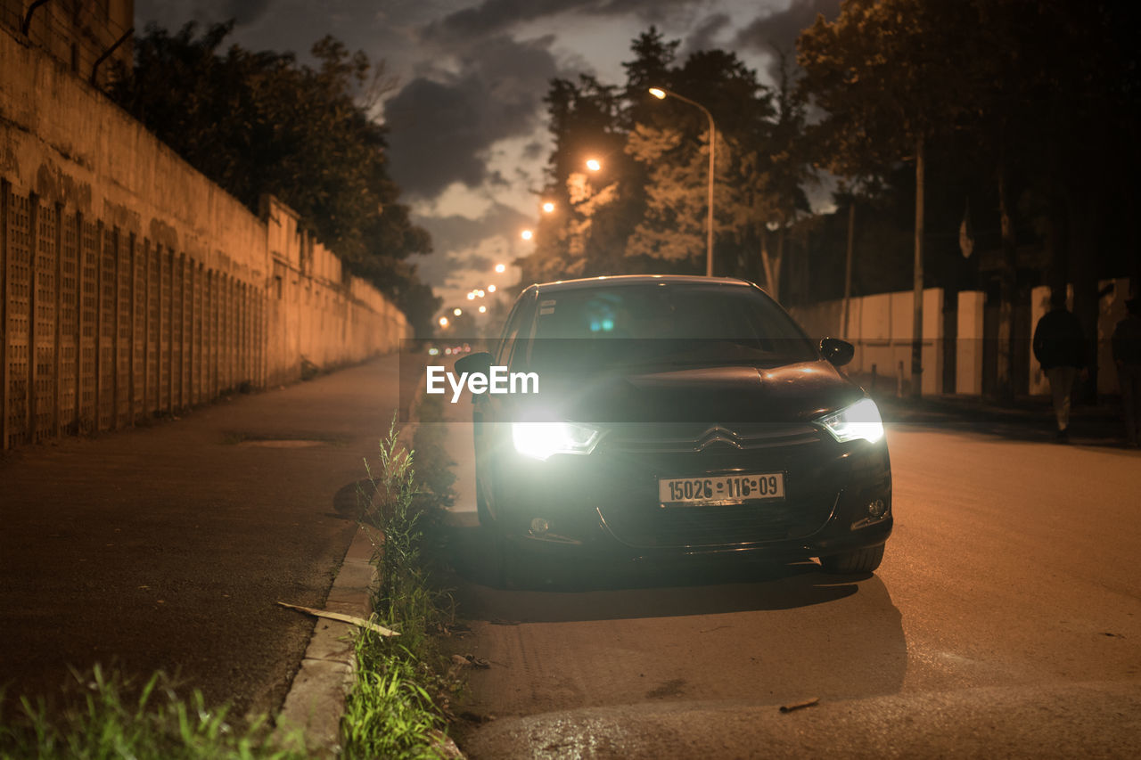 TRAFFIC ON ROAD AT NIGHT