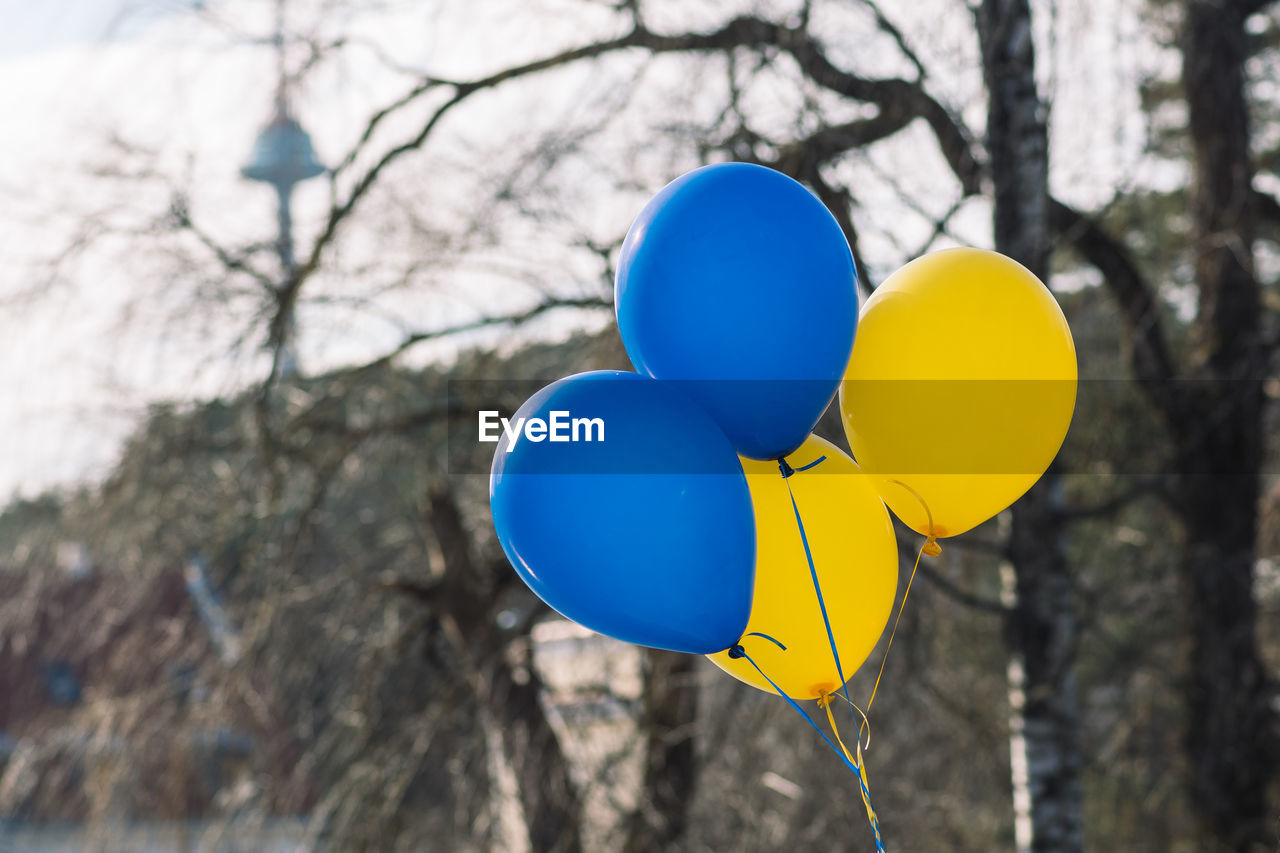 Balloons during a peaceful demonstration against war in support of ukraine with vilnius tv tower
