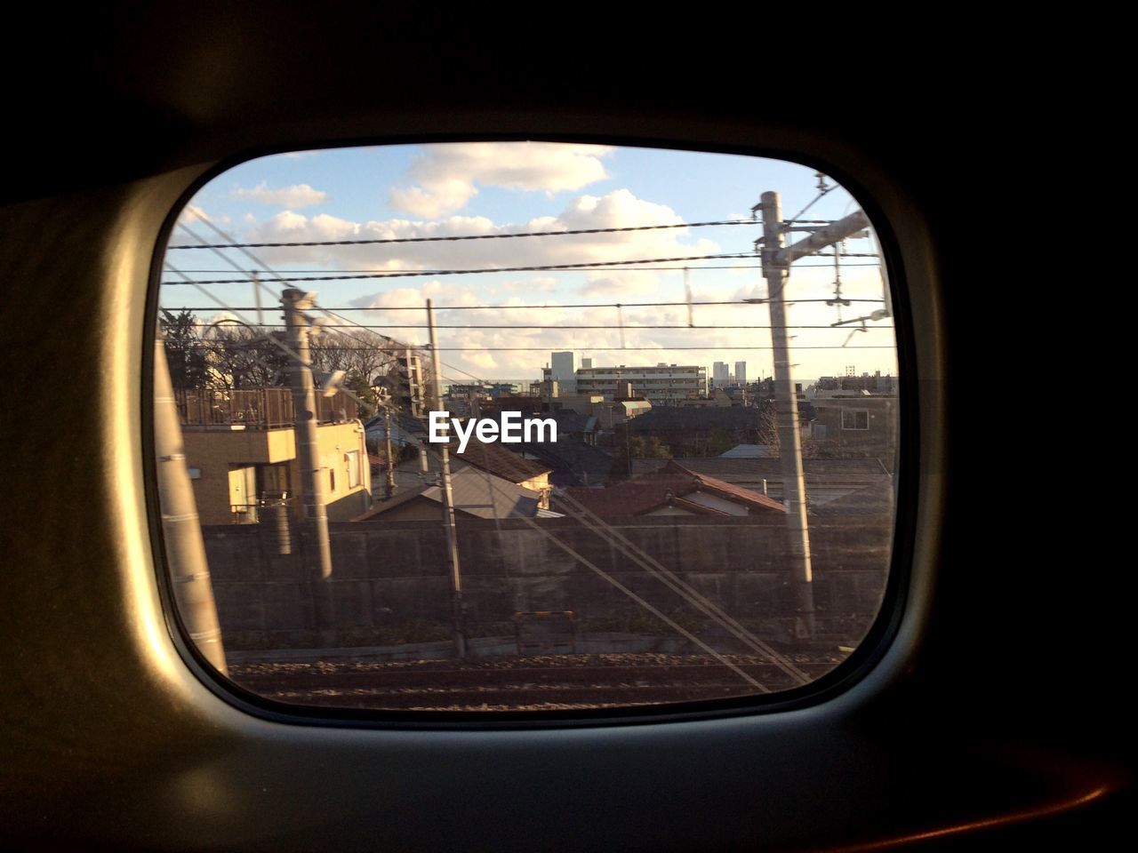 View of town seen through from train window