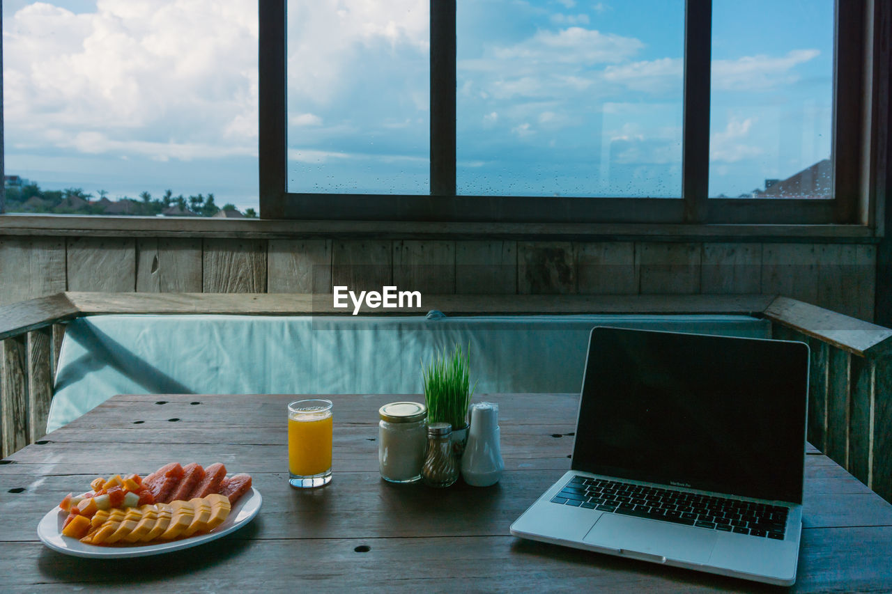 VIEW OF BREAKFAST ON TABLE AT WINDOW