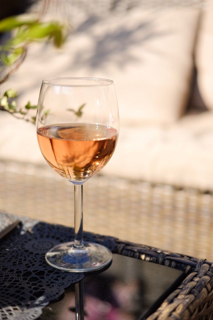 Close-up of wineglass on table