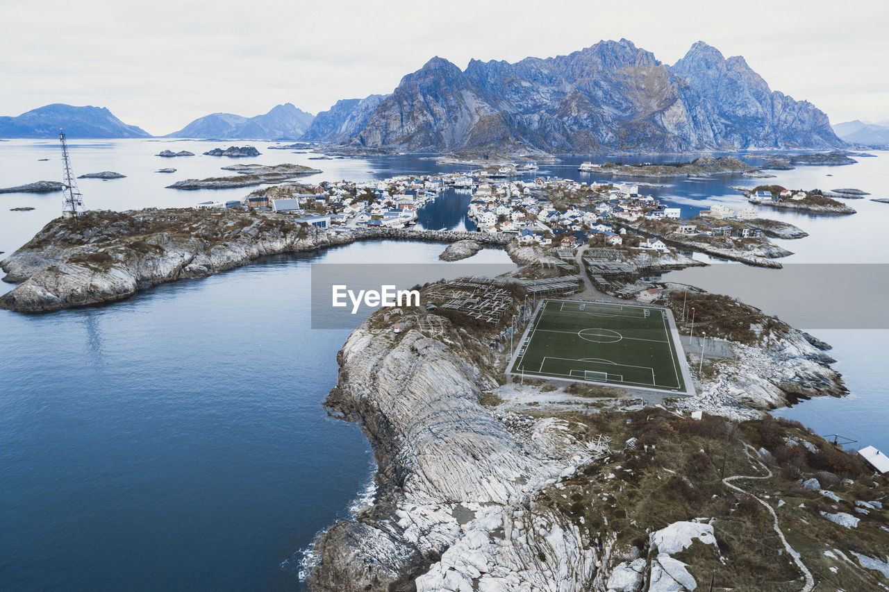 Soccer field on the cliffs of henningsvær by the sea