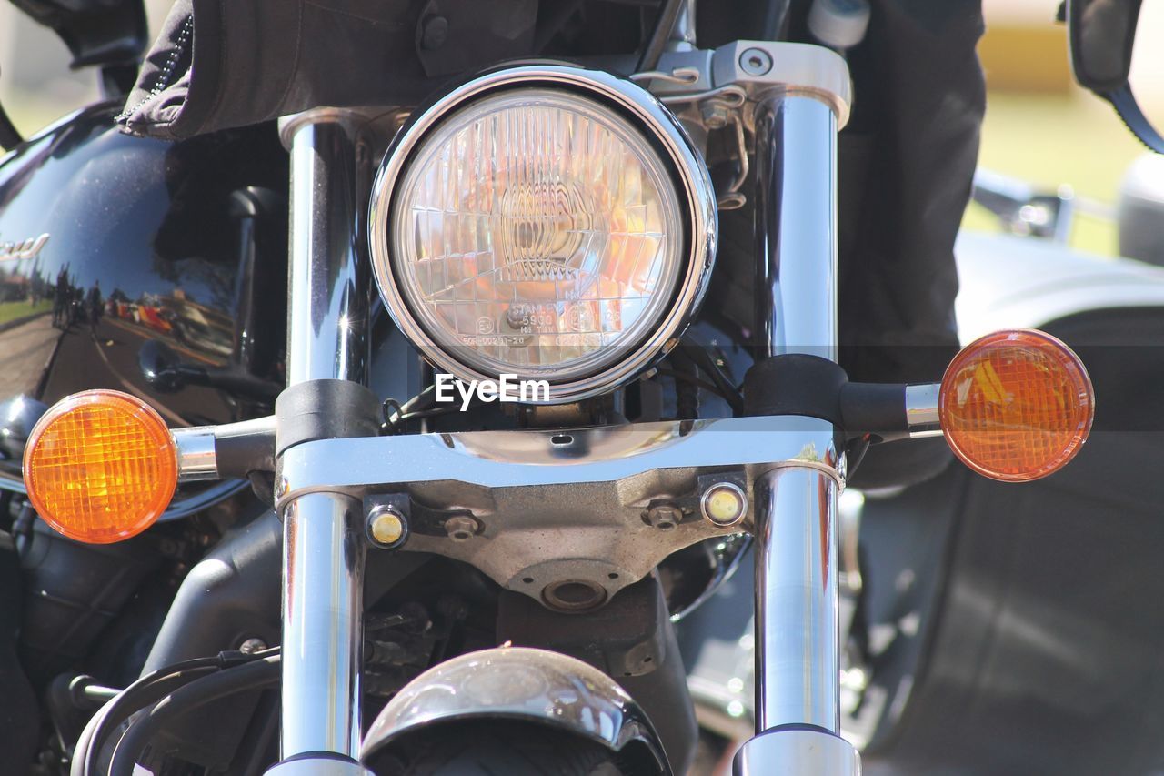 Close-up of motorbike headlight