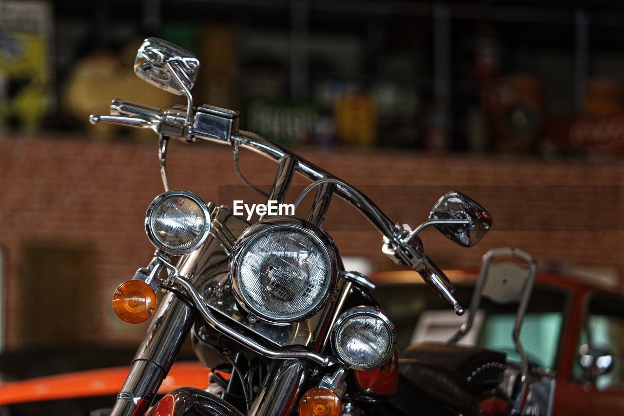 CLOSE-UP OF BICYCLE ON METAL