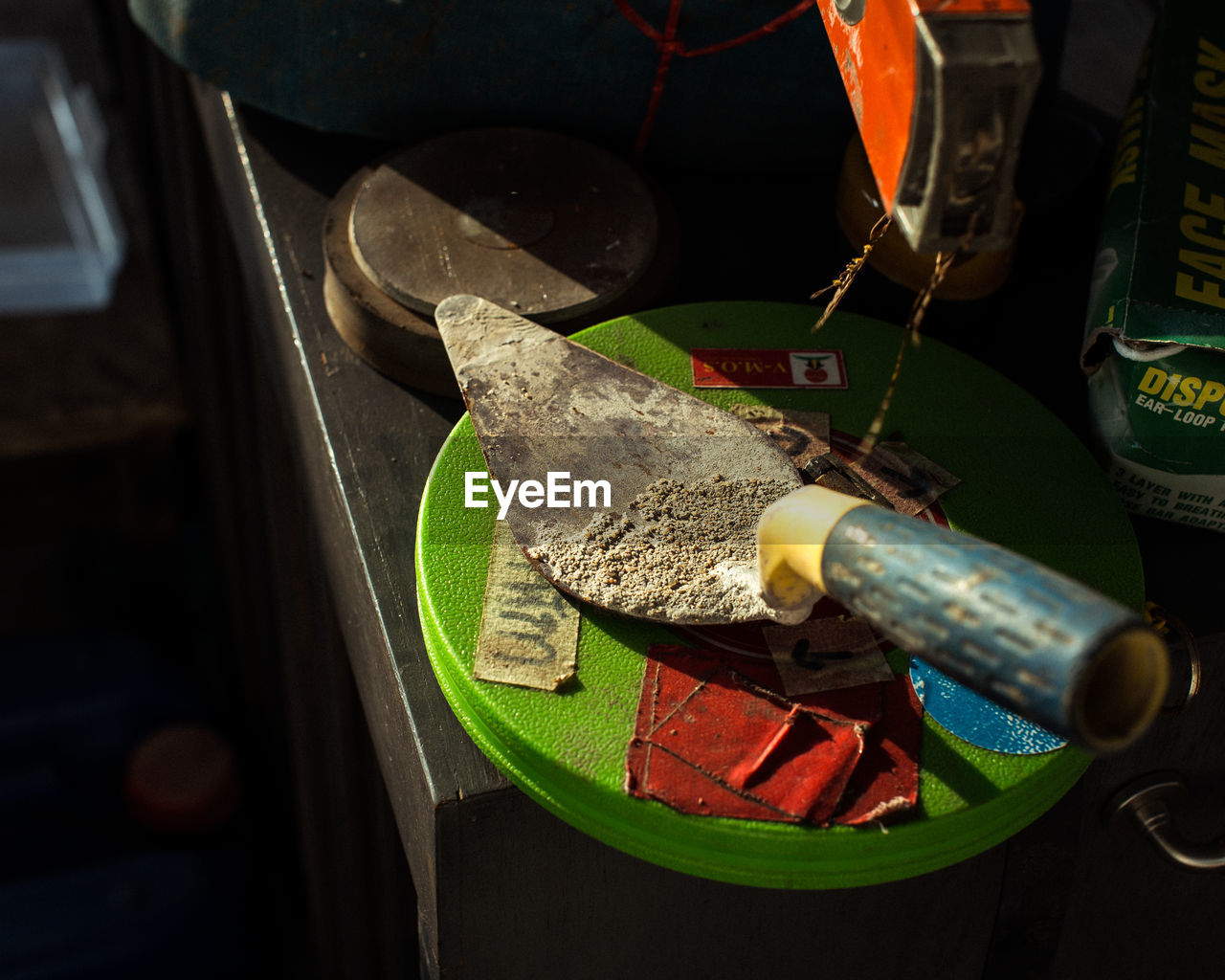 Close-up of work tools on table