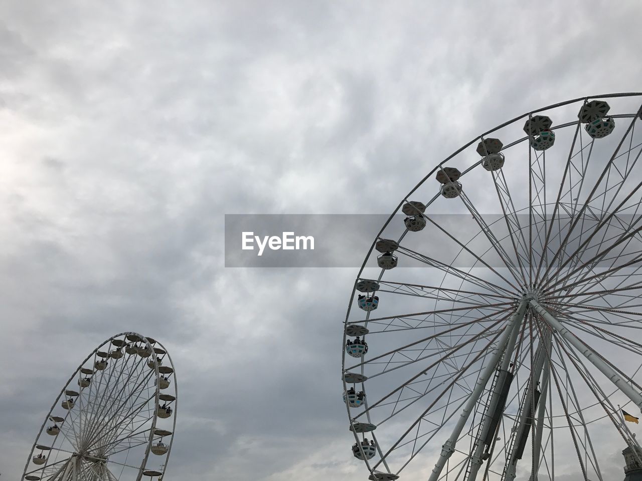 LOW ANGLE VIEW FERRIS WHEEL AGAINST SKY