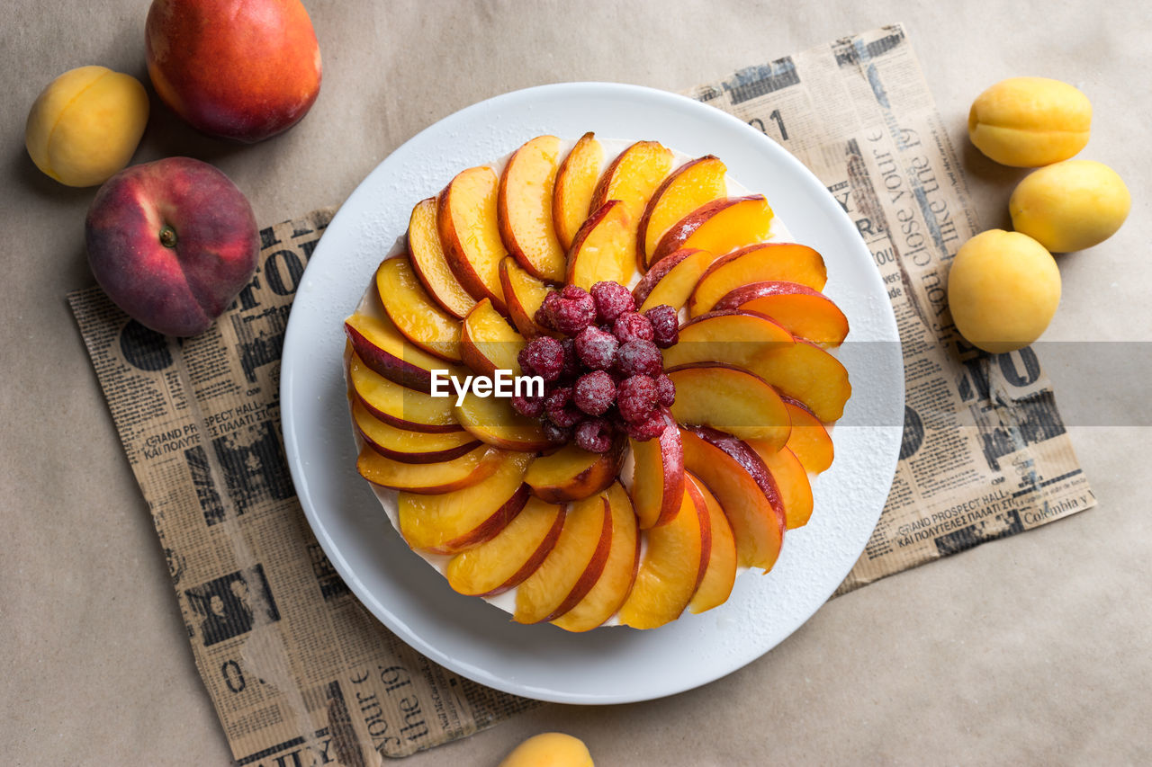 HIGH ANGLE VIEW OF FRUITS IN PLATE