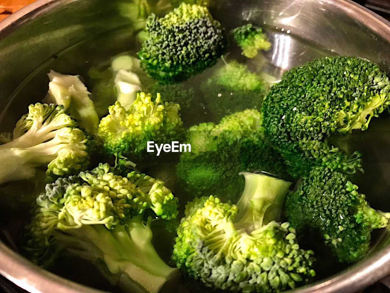 HIGH ANGLE VIEW OF CHOPPED VEGETABLES IN CONTAINER