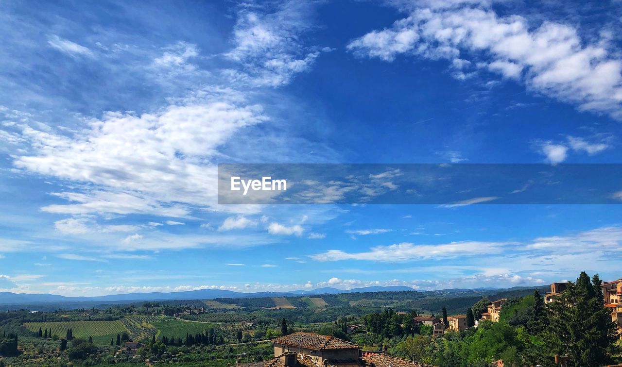 PANORAMIC VIEW OF TREE AND BUILDING AGAINST SKY