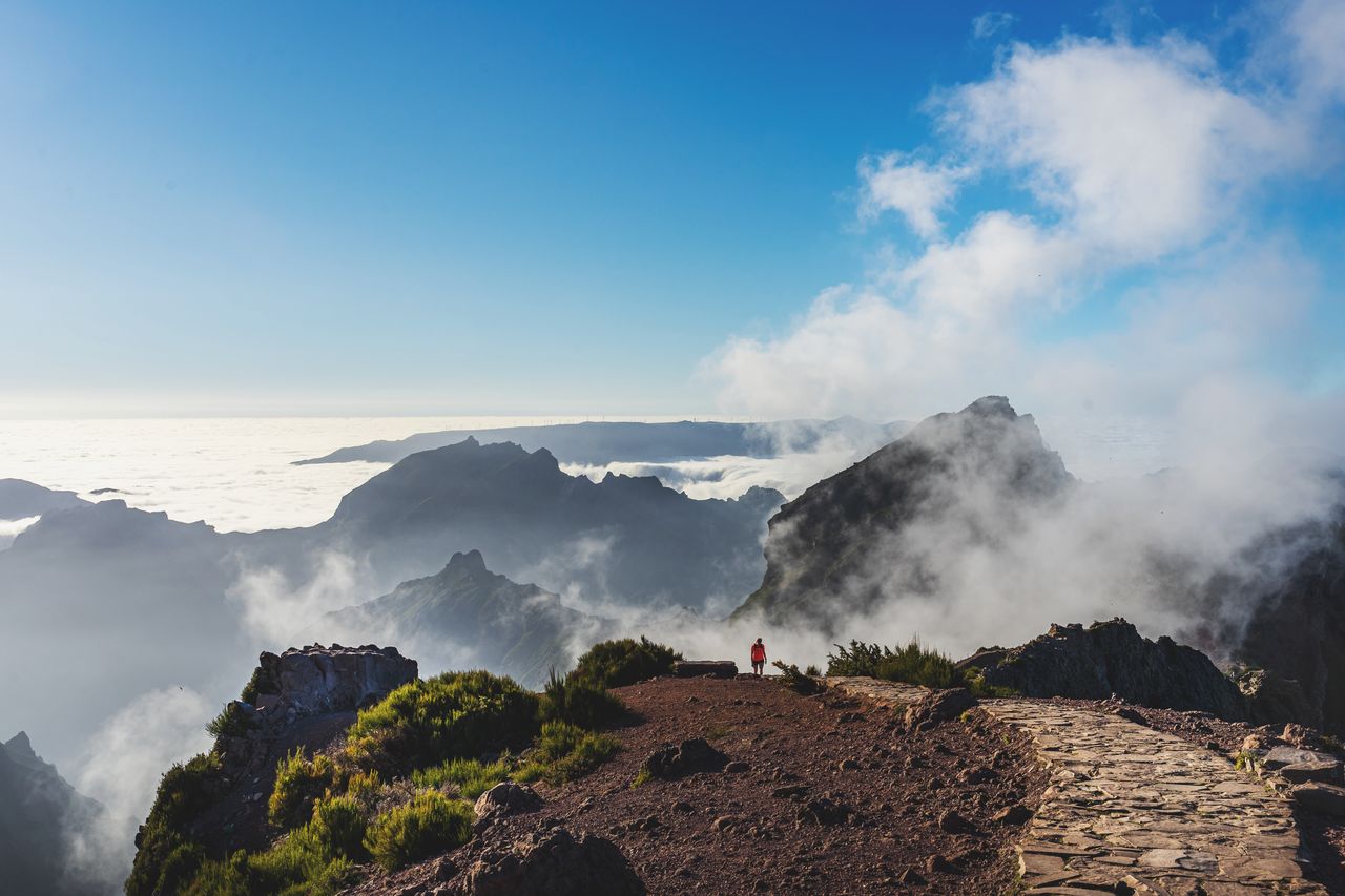 Panoramic view of landscape against cloudy sky