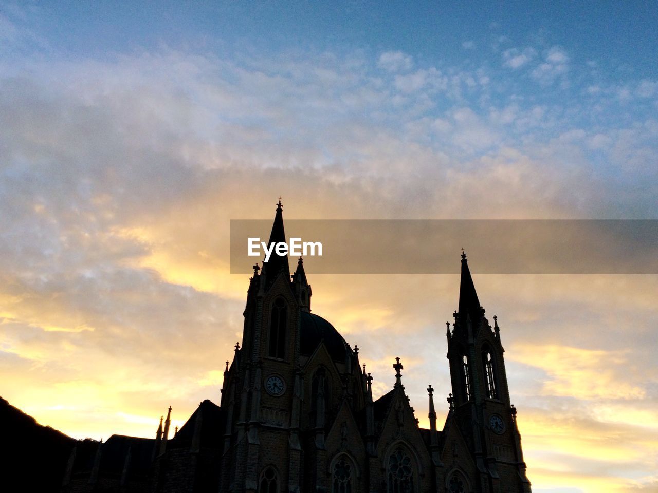 LOW ANGLE VIEW OF CHURCH AT NIGHT