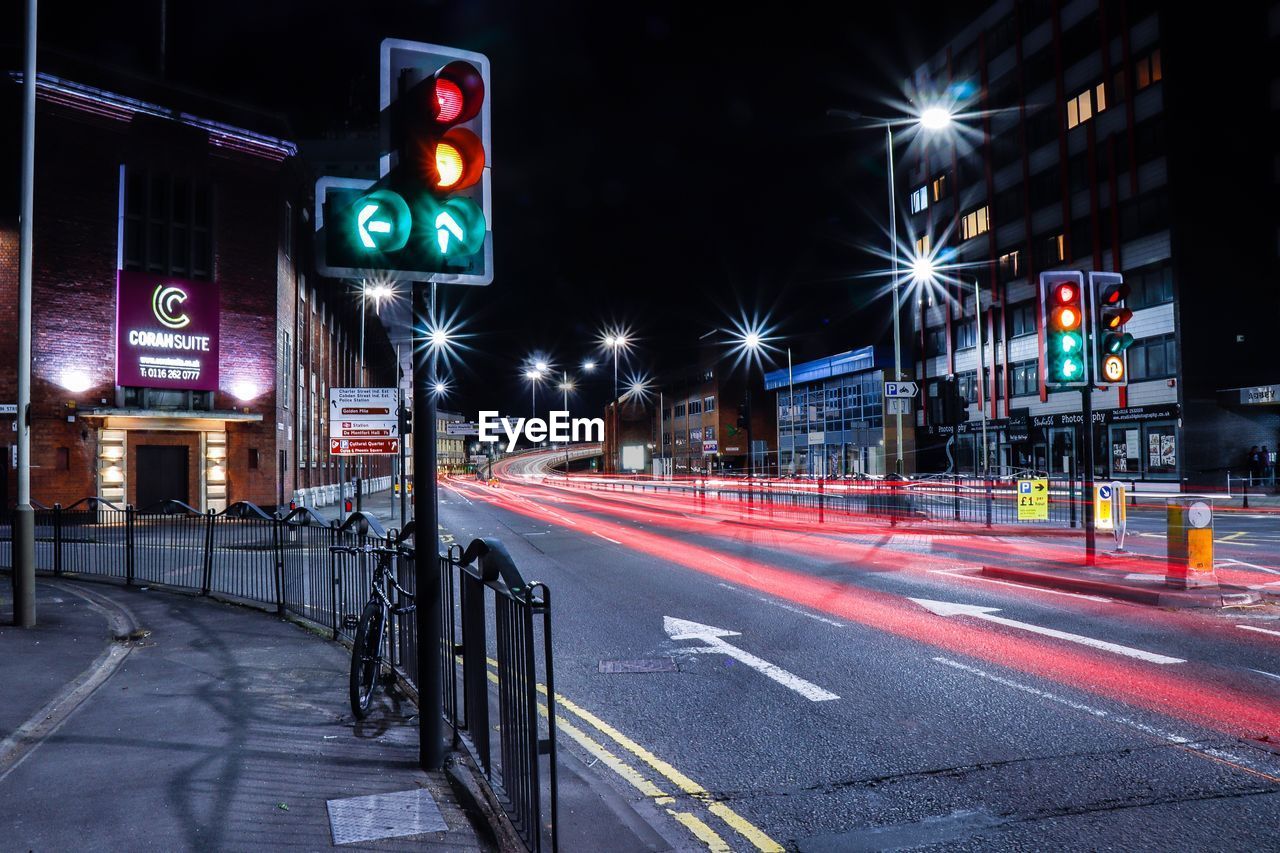 Light trails on city street at night