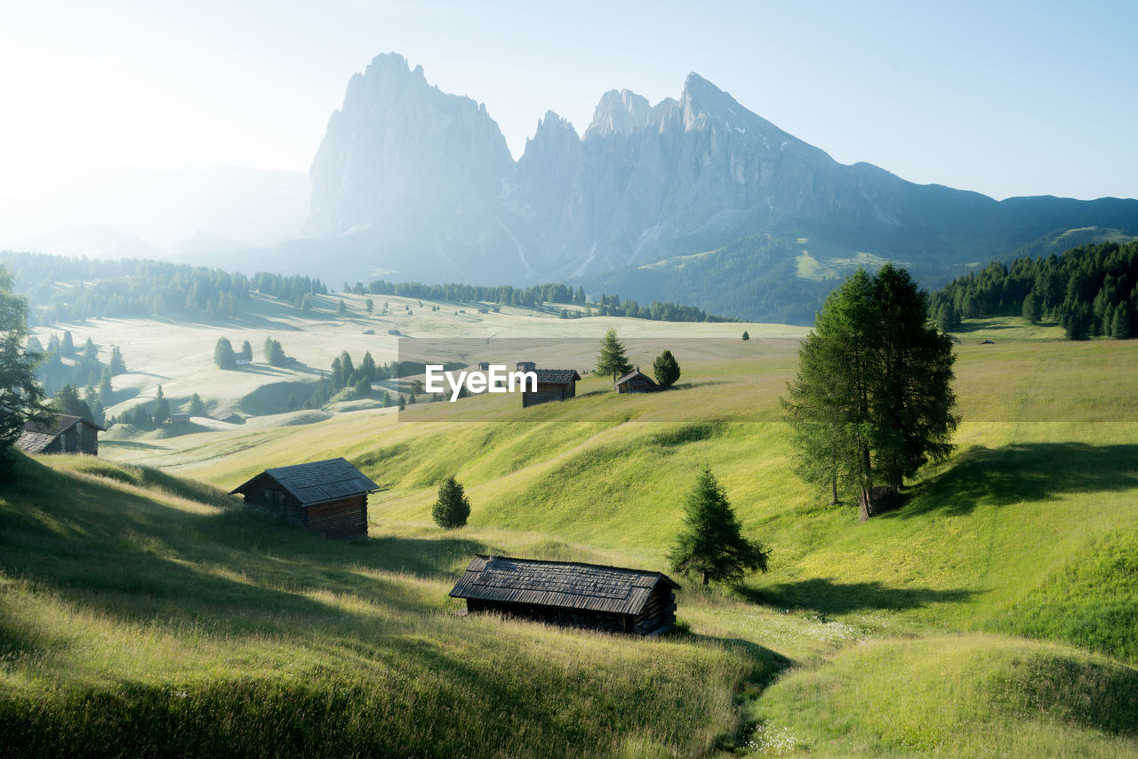 Scenic view of landscape and mountains against sky