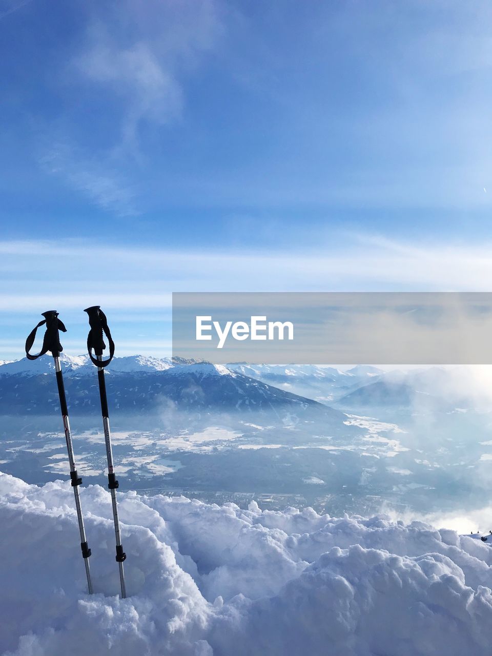 Low angle view of snow covered mountain against sky