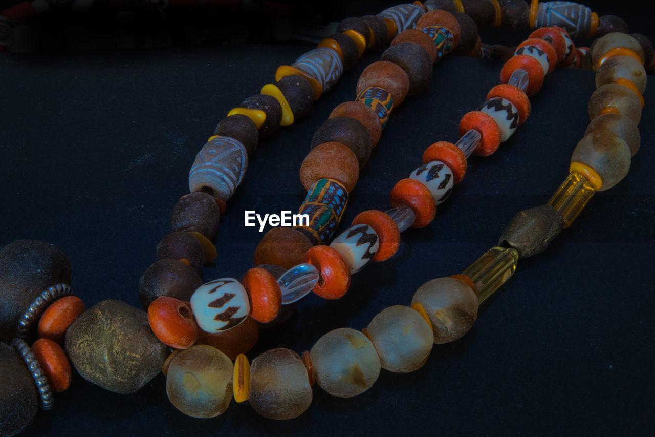HIGH ANGLE VIEW OF CANDIES ON TABLE