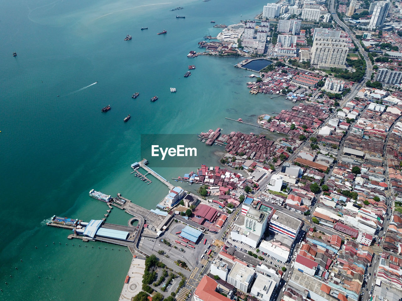 High angle view of marina and buildings in city