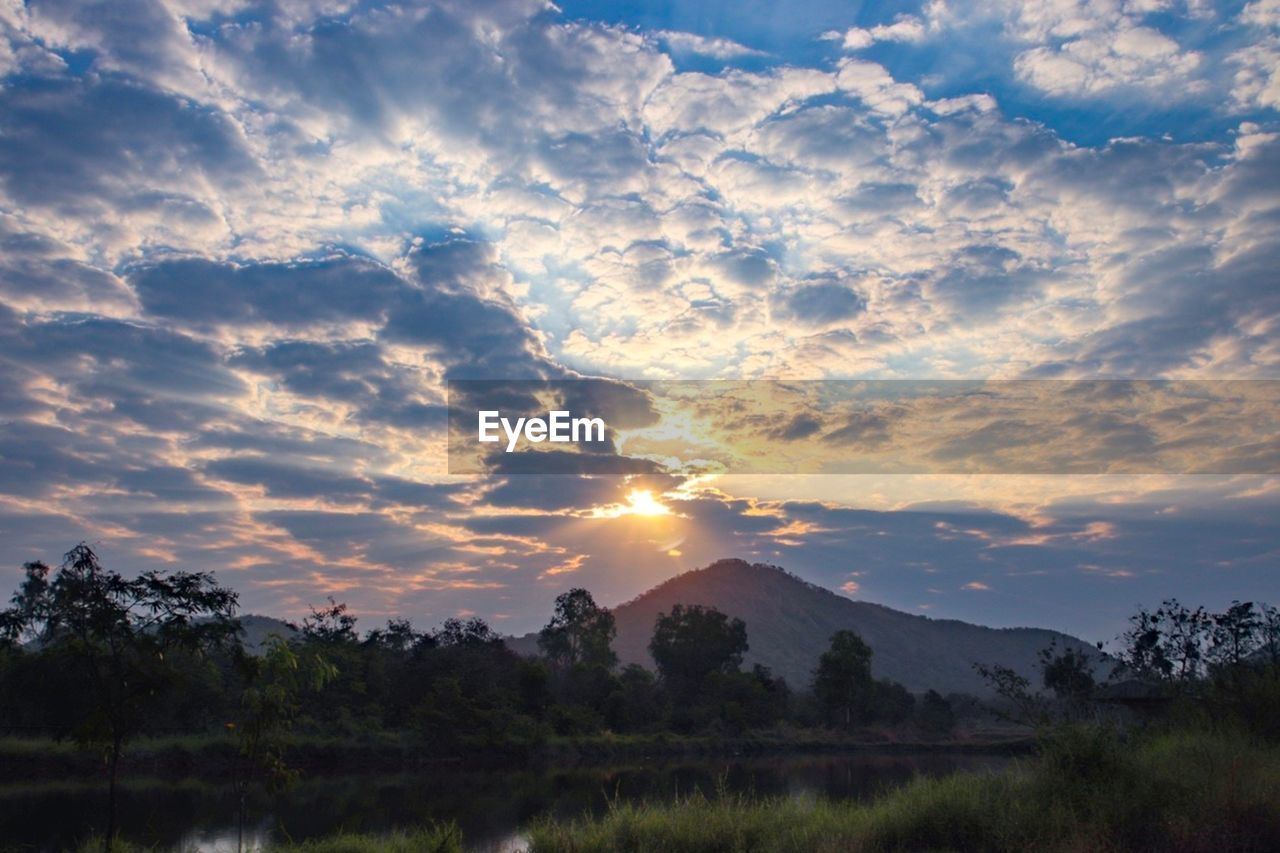 Scenic view of silhouette landscape against sky during sunset