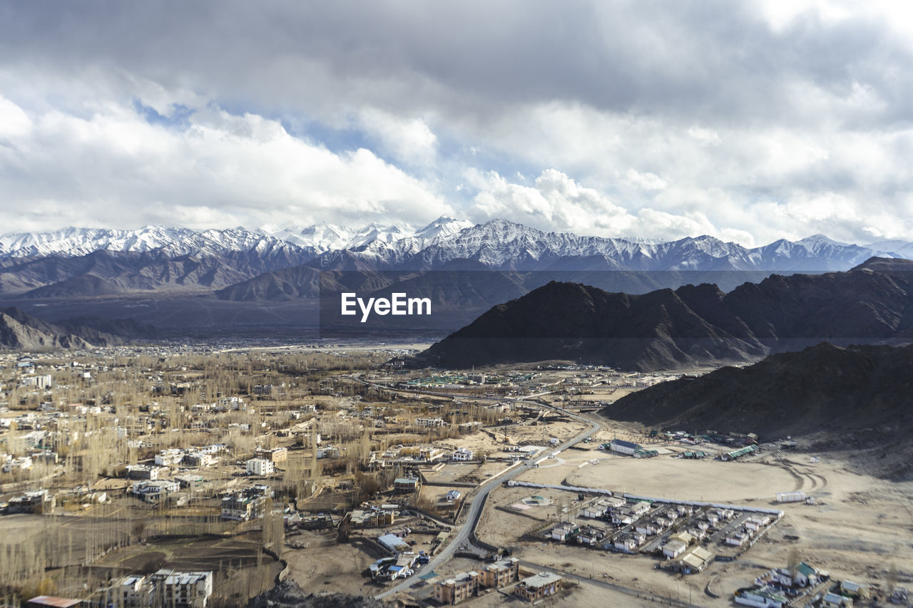 Beautiful landscape of ladakh city from aerial view. city covered with mountains and a cold desert.