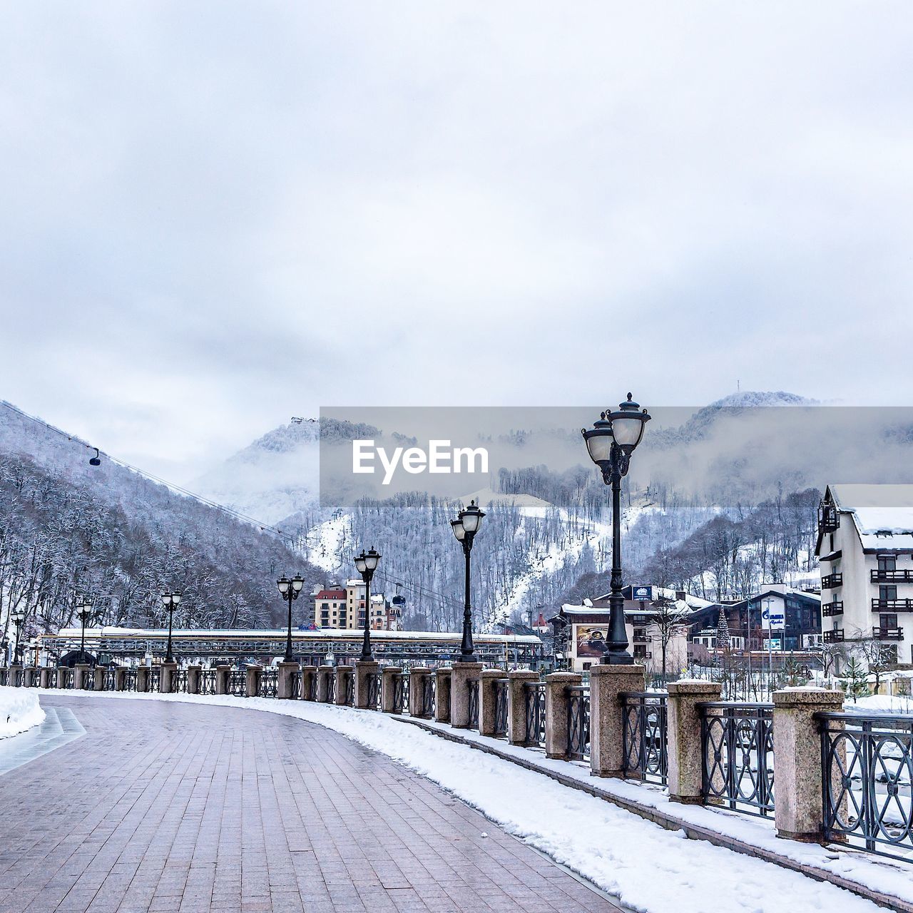 Scenic view of snow covered mountains against sky