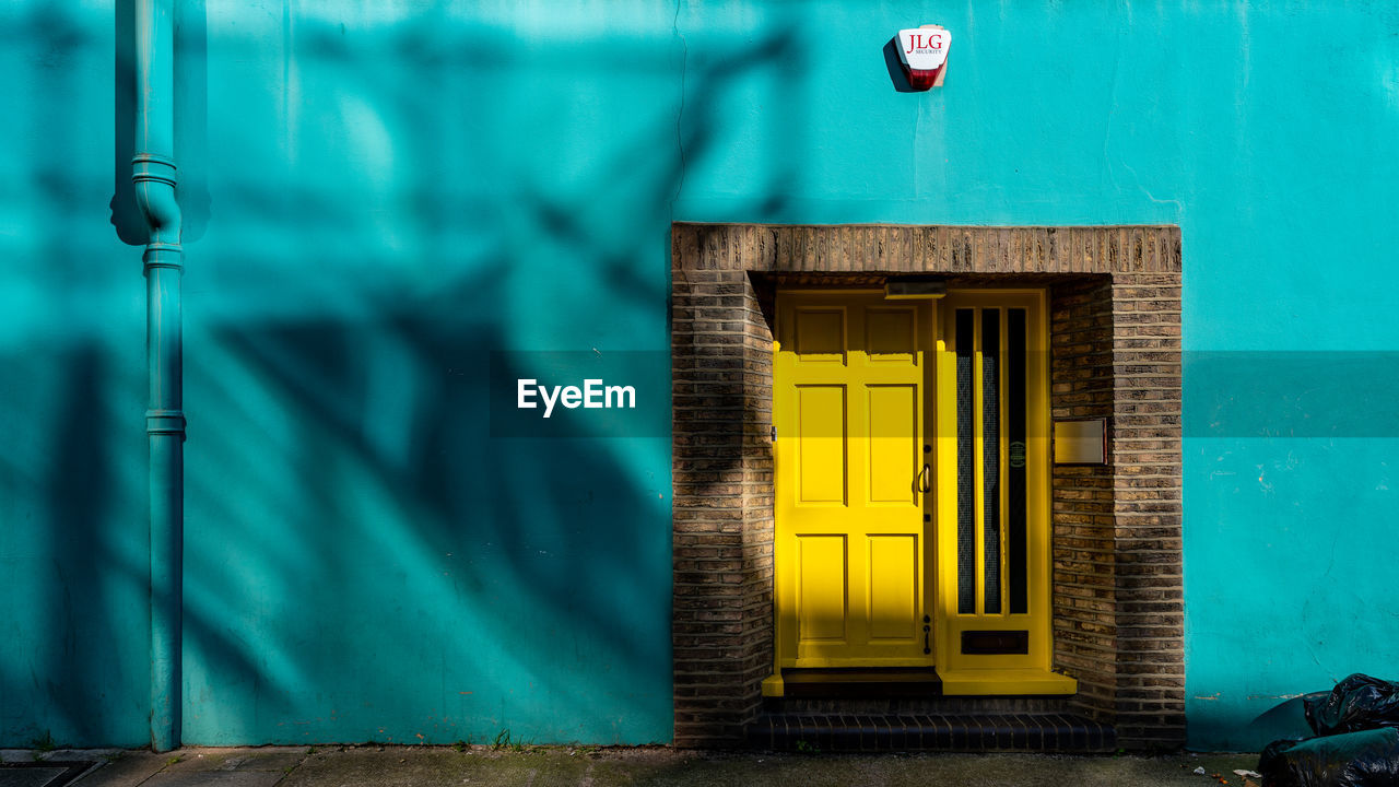 CLOSED BLUE DOOR OF HOUSE