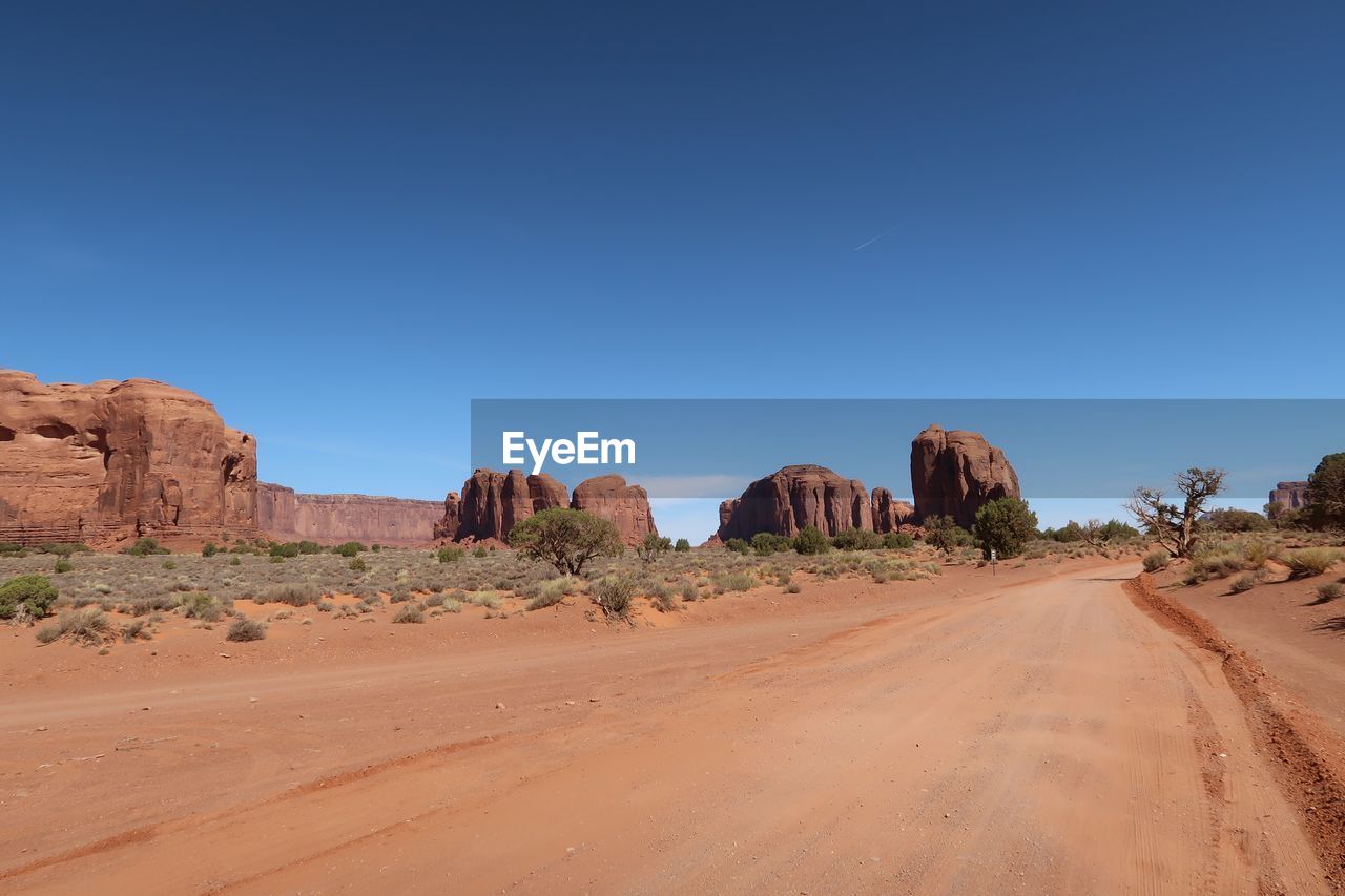 View of desert against clear sky