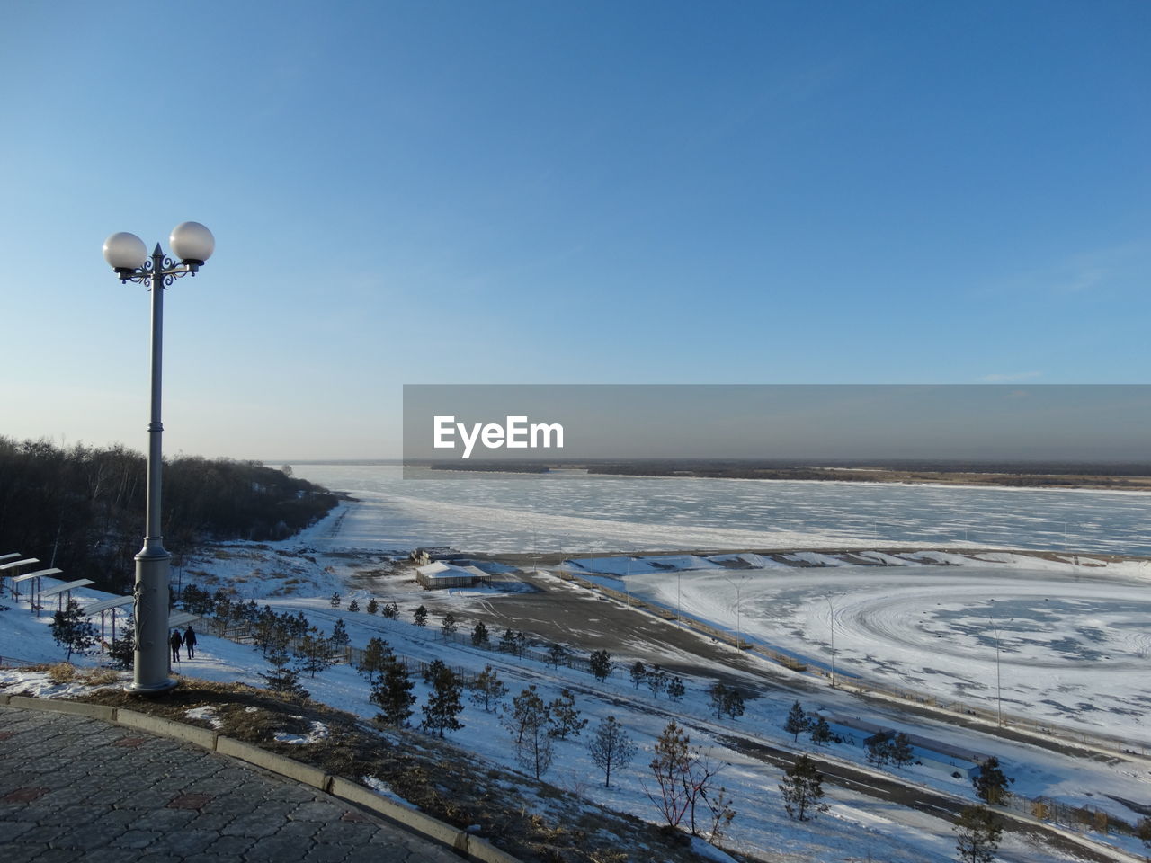 STREET LIGHTS ON SNOW COVERED LAND