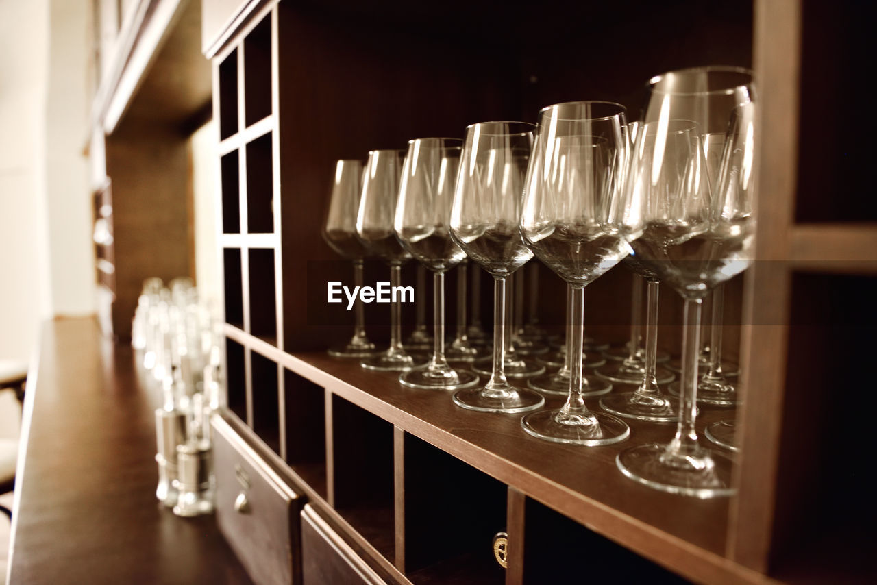 Empty wine glasses in row. shallow depth of field. focus on foreground