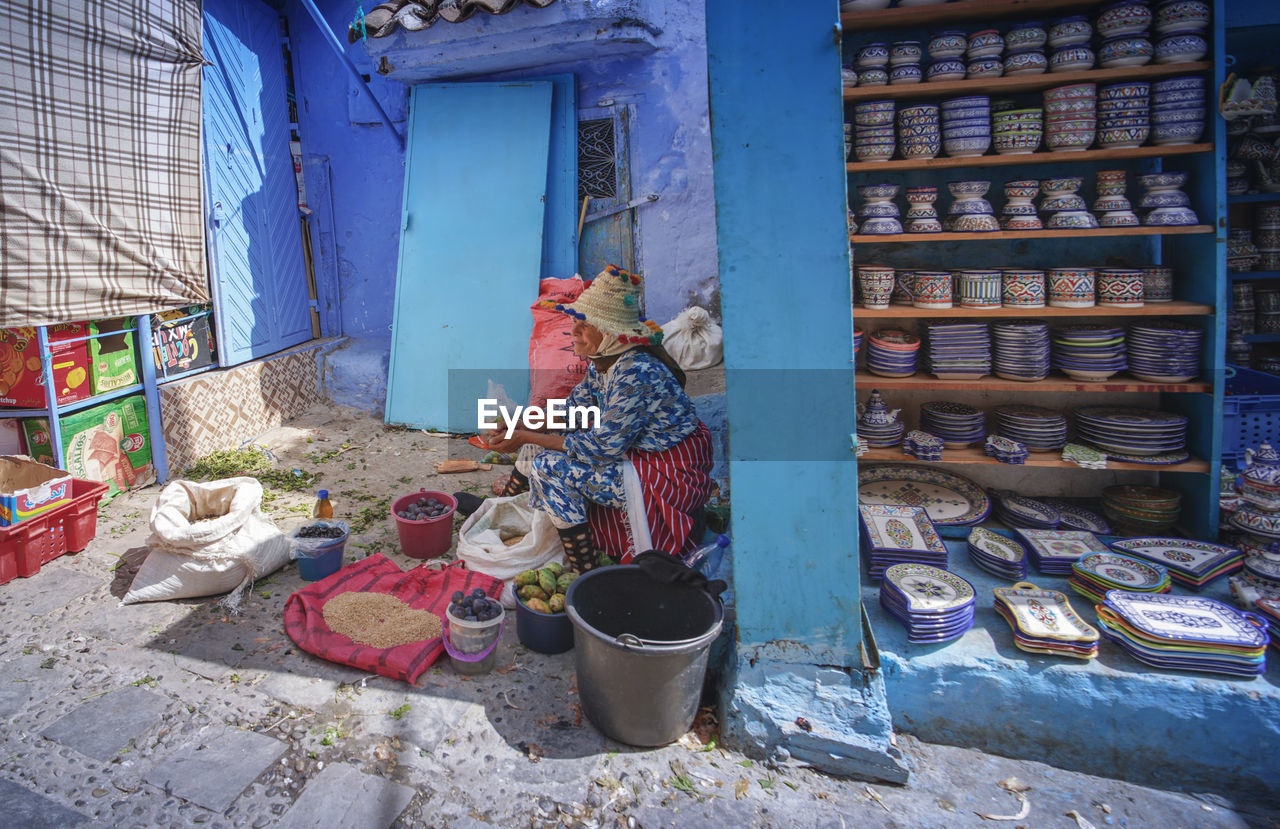 "The Blue City" - A day in the market life Chefchaouen Chefchaouen Medina Chefchaouen Blue City Morocco Travel Destinations Travel Travel Photography Digital Nomad Tourism Tourist Attraction  Tourist Destination EyeEmNewHere EyeEm Best Shots Architecture Built Structure Choice Day Large Group Of Objects Container Building No People House Outdoors Variation Small Business For Sale Abundance Building Exterior Nature Art And Craft Messy Domestic Room