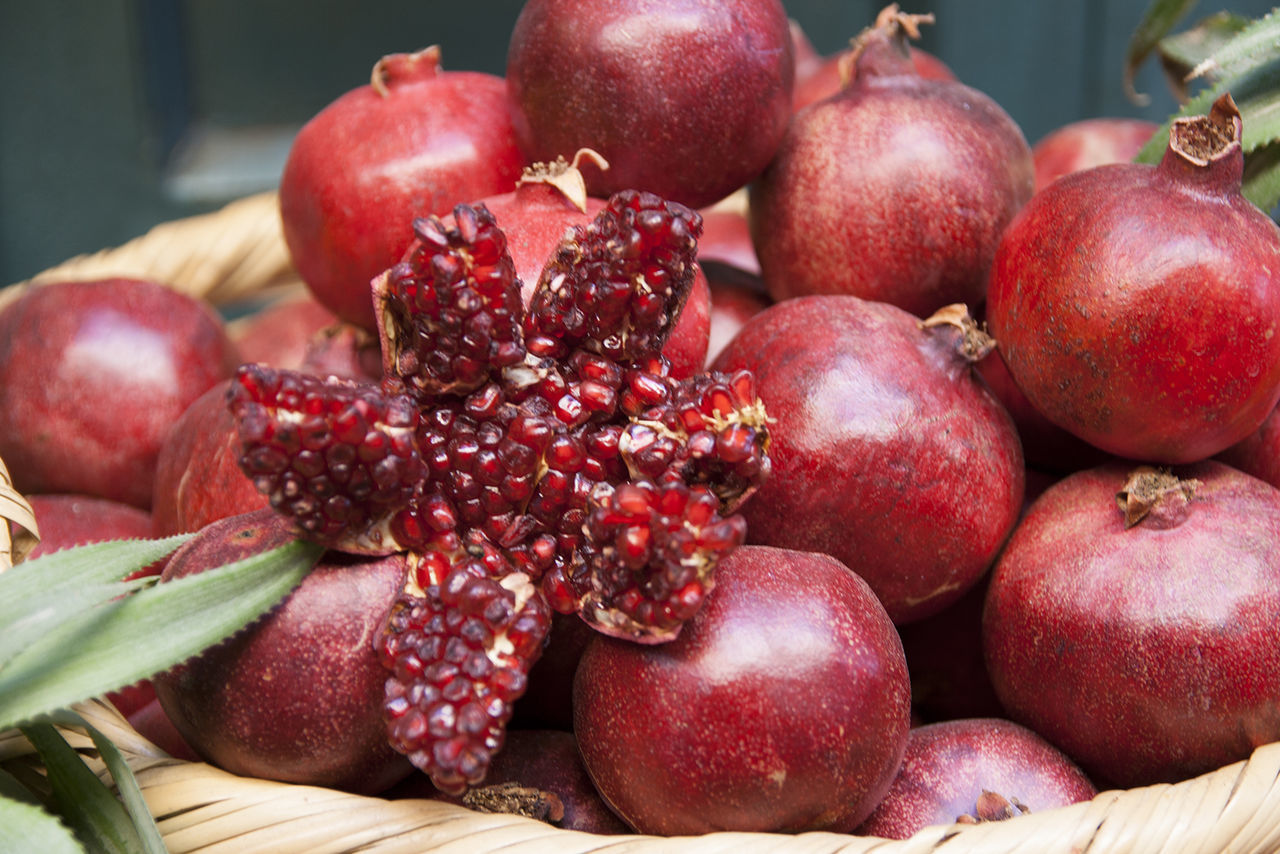 Close-up of pomegranates in basket