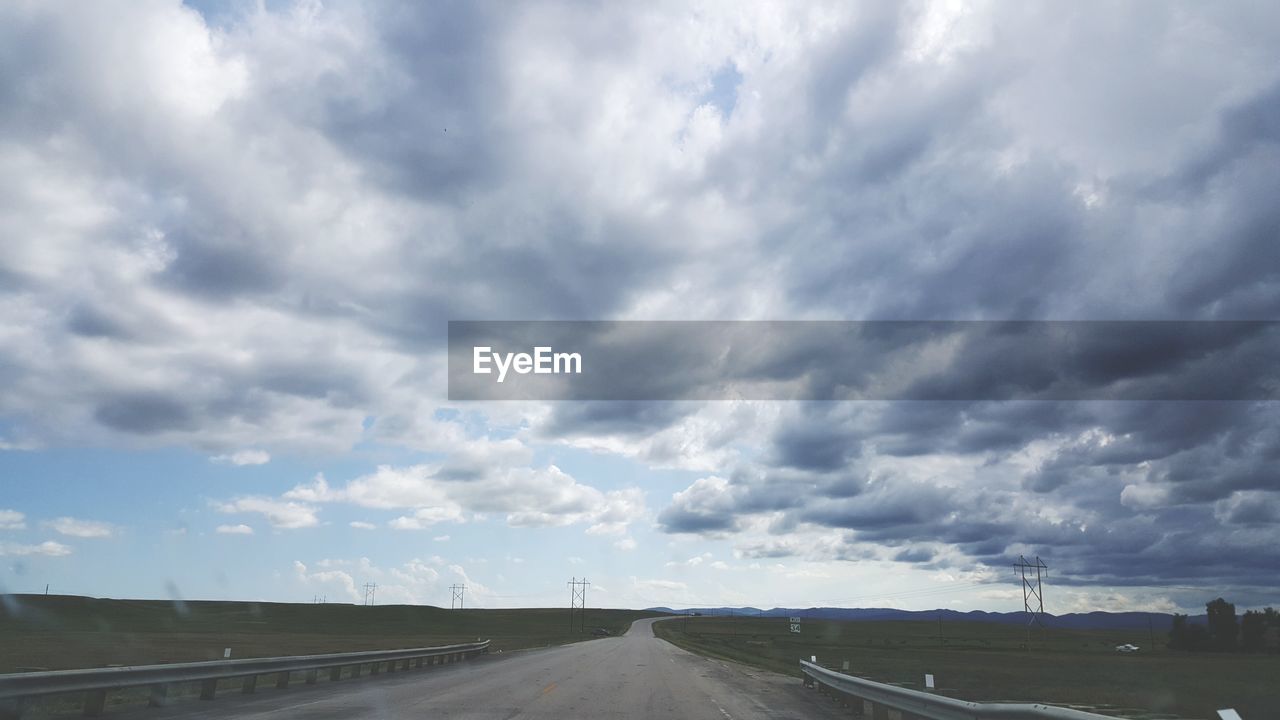 EMPTY ROAD AGAINST SKY