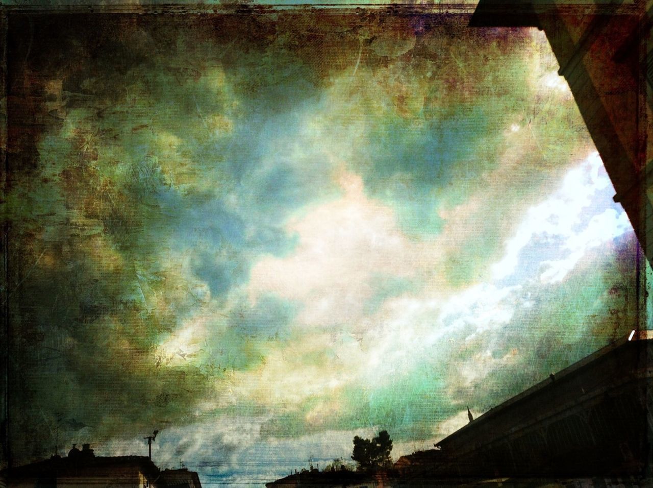 LOW ANGLE VIEW OF TREE AGAINST CLOUDY SKY