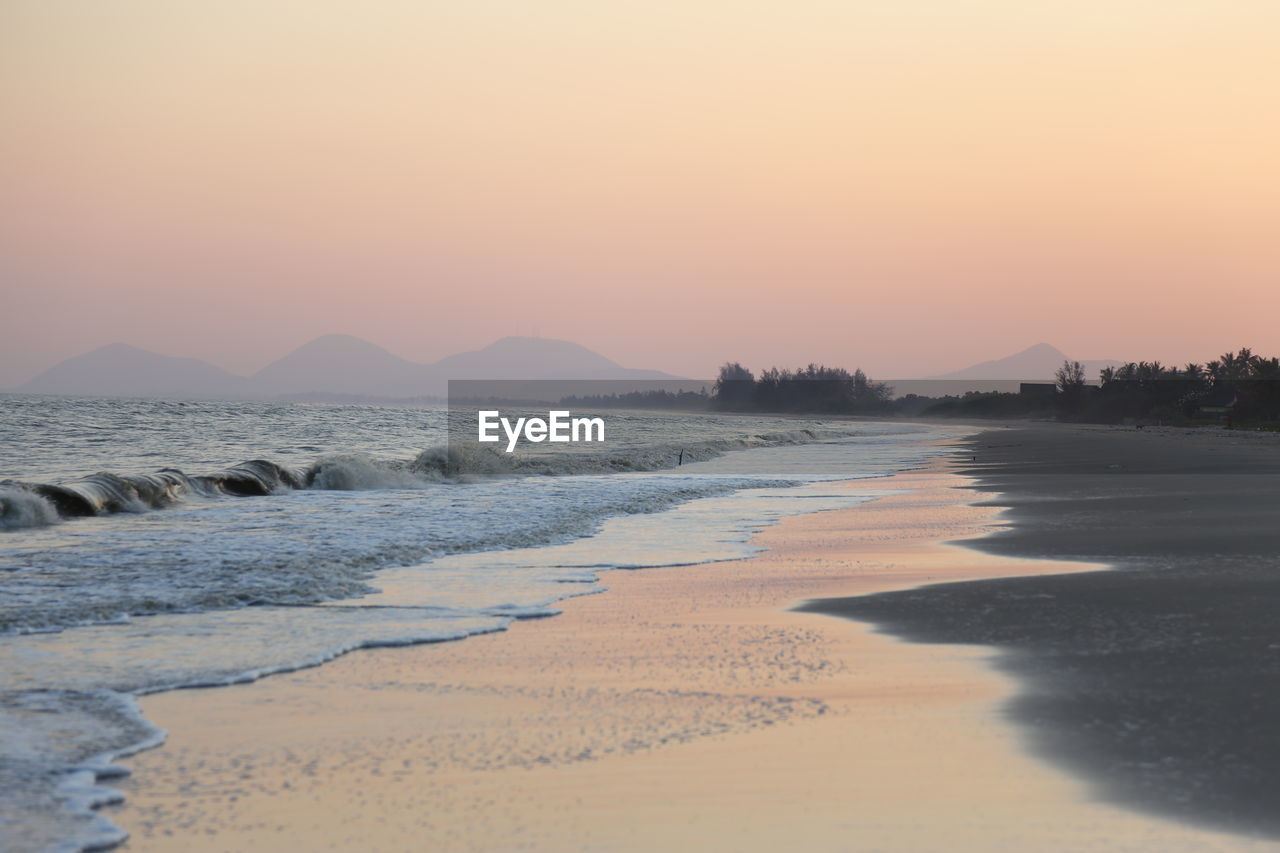 Sunset  and beach with mountain