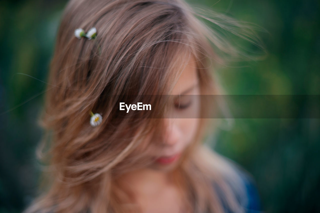 Close-up of girl looking away