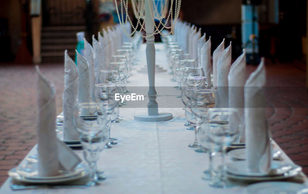 Close-up of glasses on table in restaurant