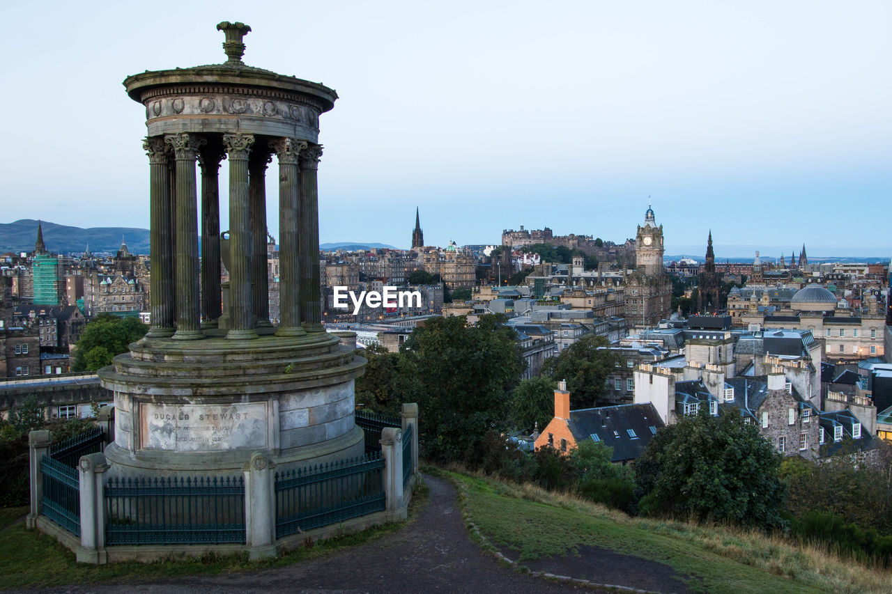 PANORAMIC VIEW OF BUILDINGS AGAINST SKY