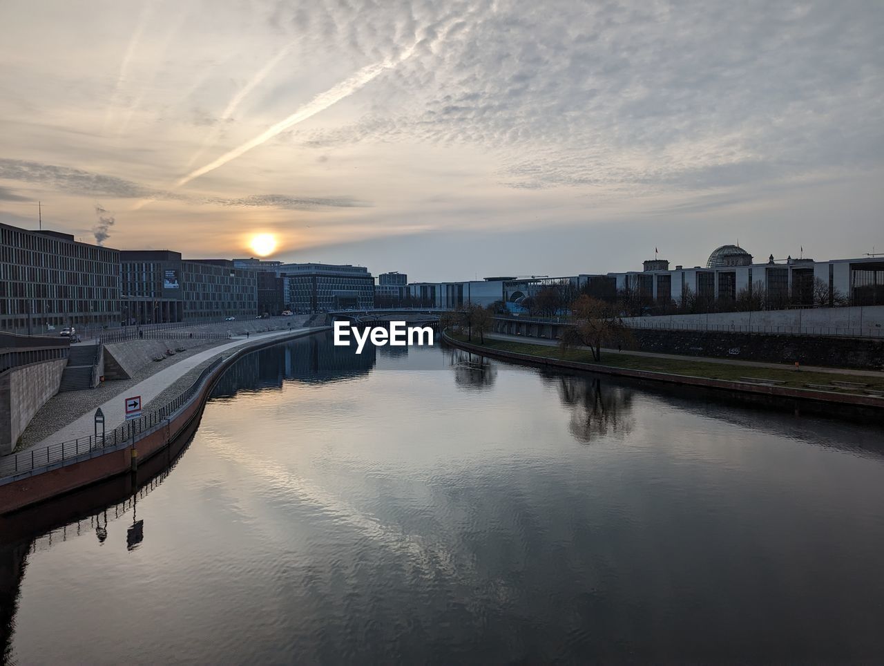 reflection, water, architecture, sky, built structure, morning, dusk, river, city, building exterior, nature, cloud, travel destinations, transportation, bridge, building, travel, horizon, landscape, cityscape, no people, nautical vessel, waterway, twilight, environment, tourism, outdoors, sunrise, waterfront, beauty in nature, urban skyline, tranquility, scenics - nature, mode of transportation, sun, city life, business finance and industry