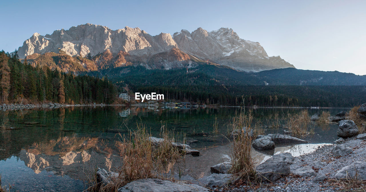 Scenic view of river against zugspitze