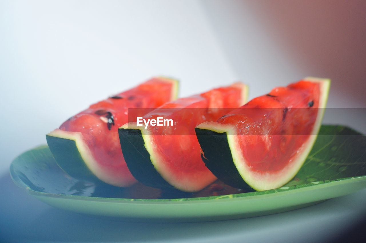 Close-up of watermelon in plate on table