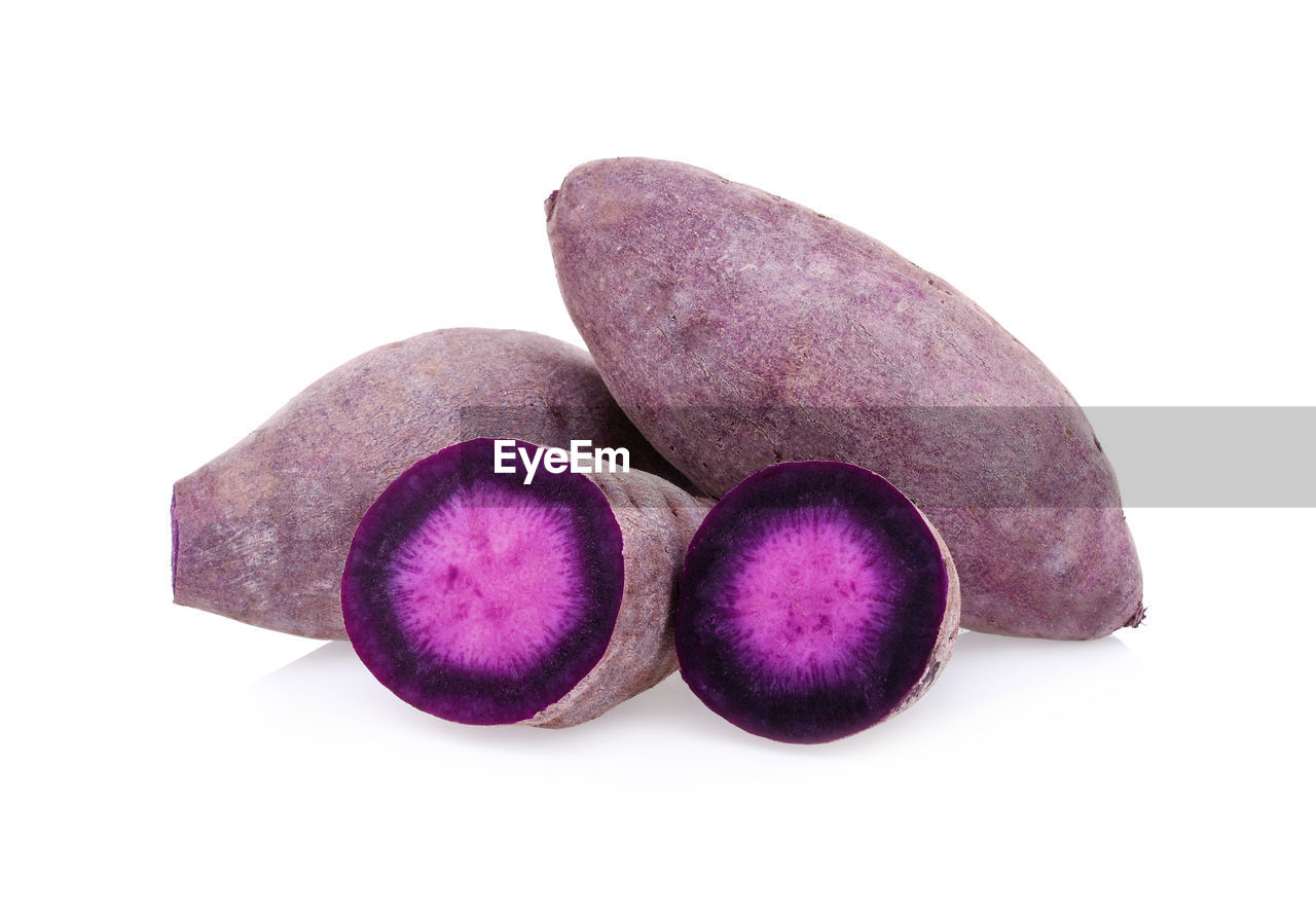 CLOSE-UP OF PURPLE FRUITS