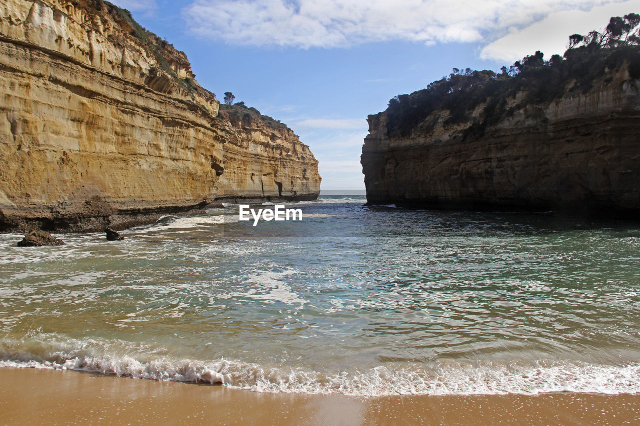 ROCK FORMATIONS ON BEACH