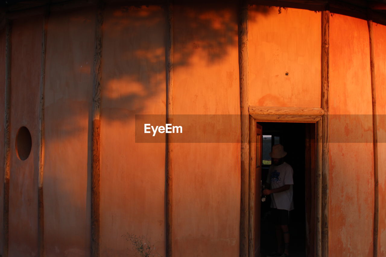 CLOSED DOOR OF WOODEN BUILDING