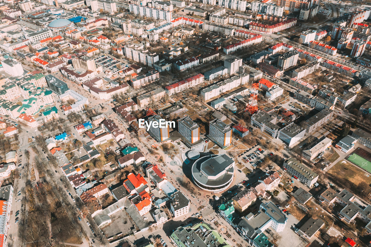 HIGH ANGLE VIEW OF CROWD ON ROAD