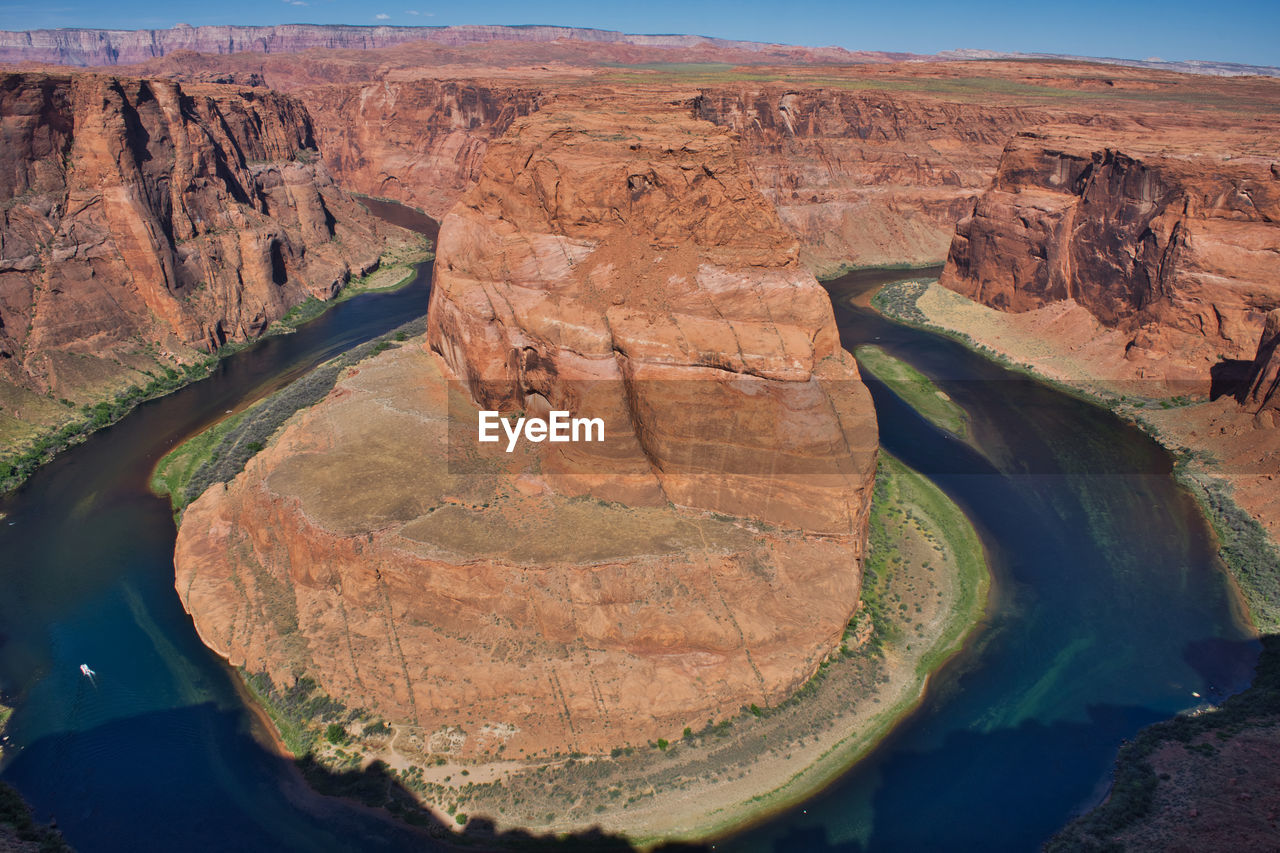 AERIAL VIEW OF ROCK FORMATIONS AT COAST